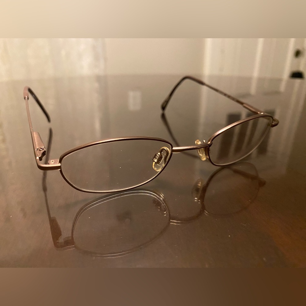 St Moritz bronze wire frame eyeglasses from the early 2000’s.